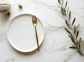 Top view of an empty plate with golden cutlery and an olive branch on a white marble table, in a flat lay top view mockup stock photo style of contest winner - obrazy, fototapety, plakaty