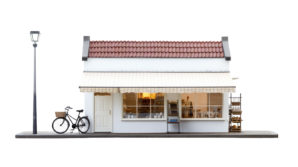 A small white building with a bicycle parked outside