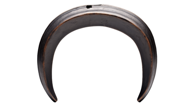 Close-up of a mysterious metal object on a pristine white backdrop