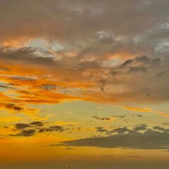 Sunset in a city on a cloudy afternoon