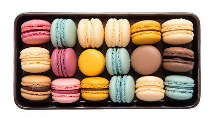 A box overflows with an array of vibrant, delectable macaroons in assorted flavors