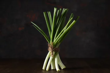 Schilderijen op glas Green onion, concept of fresh vegetable, fresh raw food © Atlas