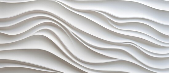 A detailed view of a white wall featuring an intricate wave pattern design