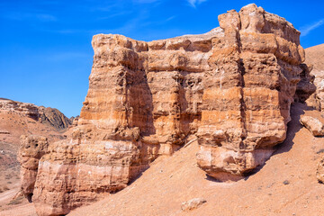 The huge Charyn Canyon in the desert of Kazakhstan. A large isolated mountain and rock in the...