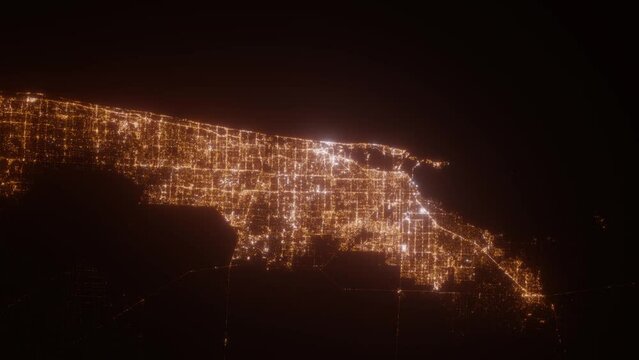 Miami (Florida, USA) top view at night. Top view on modern city with street lights and glow effect. Camera is zooming in, rotating clockwise. Vertical video. The north is on the left side