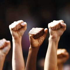 A photo of hands up symbolizes victory