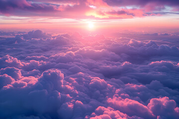 A breathtaking sunset over the clouds, creating a peaceful and dramatic atmosphere. Perfect for nature and travel-related content.