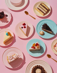 Pastel colored plates featuring various cakes, arranged on an pastel pink background with pastel colors and a soft shadow effect.