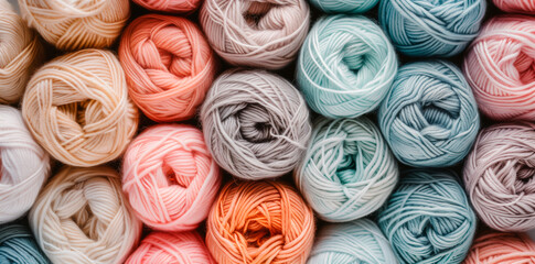 Assorted pastel yarn skeins for knitting and crafting. - obrazy, fototapety, plakaty