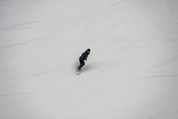 Ski, Snowboard freeride i deep powder snow. Gudauri Georgia Caucasus resort. Freeride in Caucasus mountains. Freeride snowboarding in winter. Heliboarding freeride. Riding in powder on snowborad.