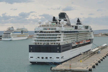 Modern cruiseship or cruise ship liner Infinity arrival into Palma de Mallorca, Spain cruise port...
