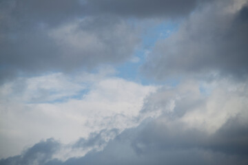Naklejka na ściany i meble a photo of a cloudy sky. Sky background. natural clouds.