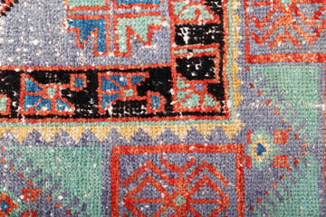 Textures and patterns in color from woven carpets