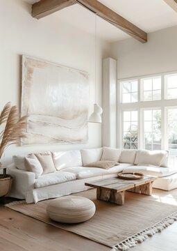 beautiful interior with beidge oil paintings on the wall and white sofa, boho style