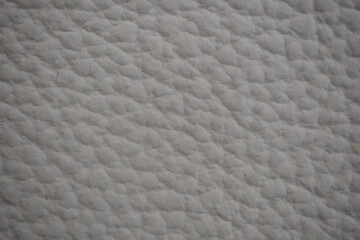 Car seat beige natural leather texture extreme close-up
