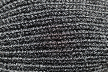 Closeup of simple black acrylic rib knit fabric