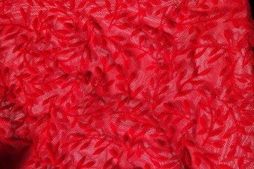 Surface of semi-transparent scarlet red burnout velvet fabric