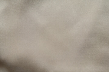 Background - simple light beige rayon fabric from above