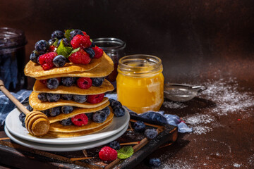 Stack of pancakes with berries