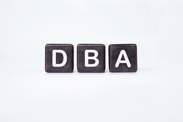 Word DBA (Database administrator) on cubes on a white background.