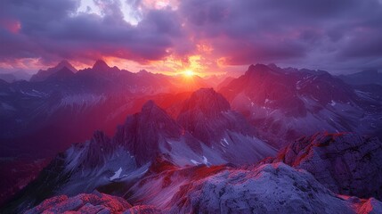 Epic Mountain Sunset: A breathtaking landscape shot capturing the vibrant hues of a sunset over towering mountain peaks, evoking a sense of adventure. 