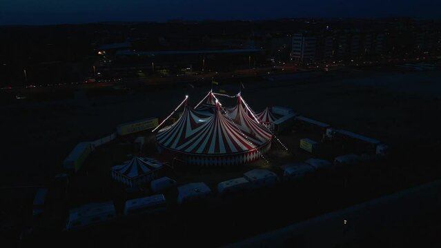 Aerial view of a circus tent in Prague during blue hour