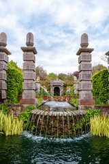 Elegant fountains and water feature known as the Arun Fountain in the Colllector Earl's Garden, Arundel Castle Gardens, West Sussex, England, UK