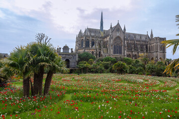 Arundel Cathedral of Our Lady and Saint Philip Howard, seen from the Gardens of Arundel Castle, West Sussex, England, UK: tulip labyrinth in the foreground