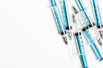 Disposable plastic syringe prepared for injection and vaccination in the hospital. The concept of...