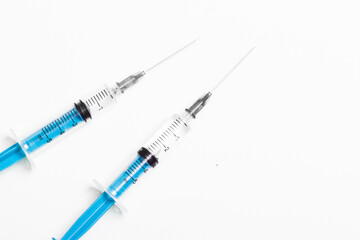 Disposable plastic syringe prepared for injection and vaccination in the hospital