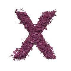 Stencil capital letter X made by burgundy crushed eye shadow or broken powder isolated on white background.