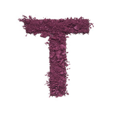 Stencil capital letter T made by burgundy crushed eye shadow or broken powder isolated on white background.