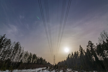 Winter landscape, electric pole in the snow