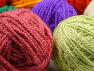 Set of the multi-colored balls of threads for hand knitting, background
