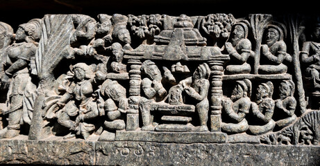 Close up detail of beautiful ornate carvings at the ancient Hoysaleswara temple in Halebeedu.