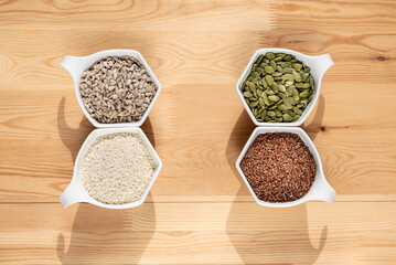 Seed cycling for hormone balance, to balance pre and post menopausal hormones. Flax, pumpkin, sesame and sunflower seeds. Balancing hormones - estrogen and progesterone. Woman health, fertility