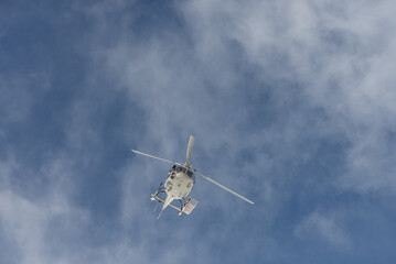 Freeride snowboarding in winter. Heliboarding freeride. Riding in powder on snowborad. Freeride in Caucasus mountains. Helicopter in the mountains. freeride heliboarding in the Caucasus. © Chawran