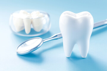 Fototapeta na wymiar dental care concept, white teeth on blue background