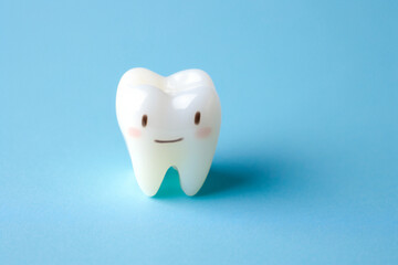 dental care concept, white teeth on blue background