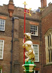 Wood Sculpture of the Tudor Royal Heraldic Beast White Hart installed at Hampton Court Palace, London, UK