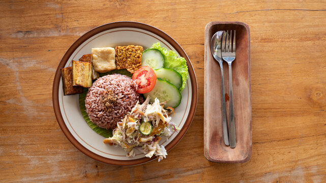 Traditional Balinese meal with brown rice and tempeh
