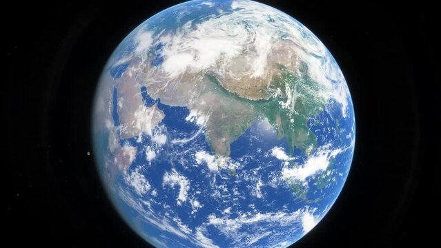 Approaching India from space. View from orbit with clouds