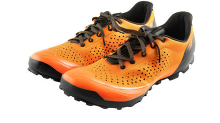 A vibrant pair of orange shoes dancing on a crisp white background