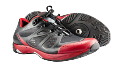 A pair of gray and red shoes dance gracefully on a white background