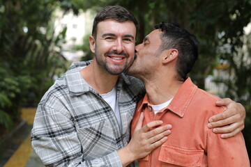 Man kissing his handsome boyfriend 