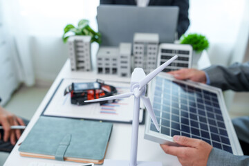 Business project entails planning for solar cell panels and wind turbines for condominiums,...
