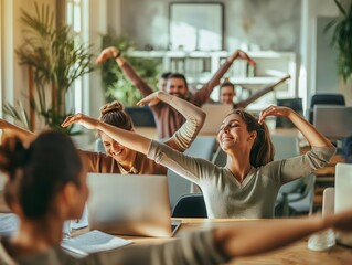 A group of coworkers stretching together in the office during a mid-day break - Powered by Adobe