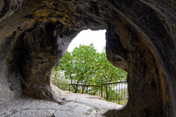 View of a mysterious small cave at the village of Nestorio in northern Greece - 774015033