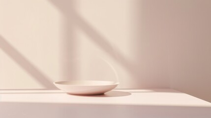 Clean kitchen table set with white ceramic bowl, spoon, plate, cup, and glass, with light and shadow,  and space for text.