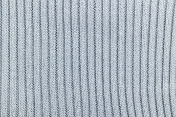 Gray knitted texture with rib pattern